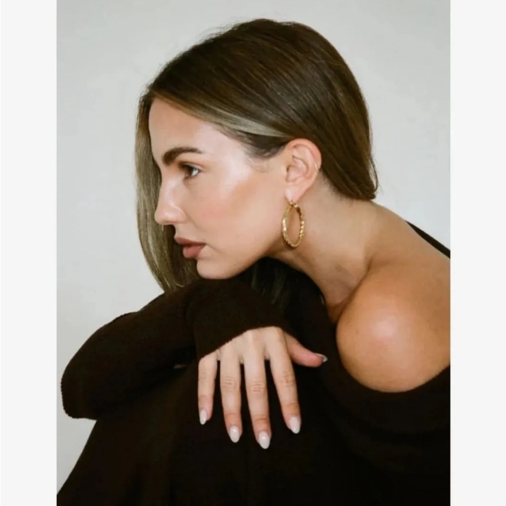 Rumored Twisted Gold Hoop Earrings